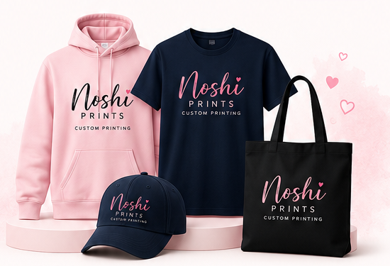 Pink hoodie, navy T-shirt, navy cap and black tote bag with Noshi Prints branding